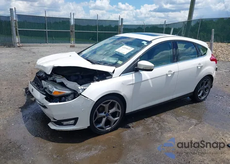 2016 Ford Focus Titanium z USA, uszkodzony, nr VIN 1FADP3N21GL309340